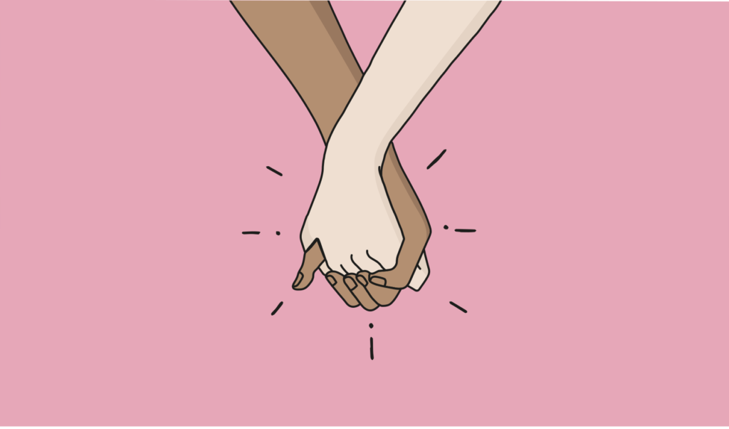 Två händer som håller varandra
